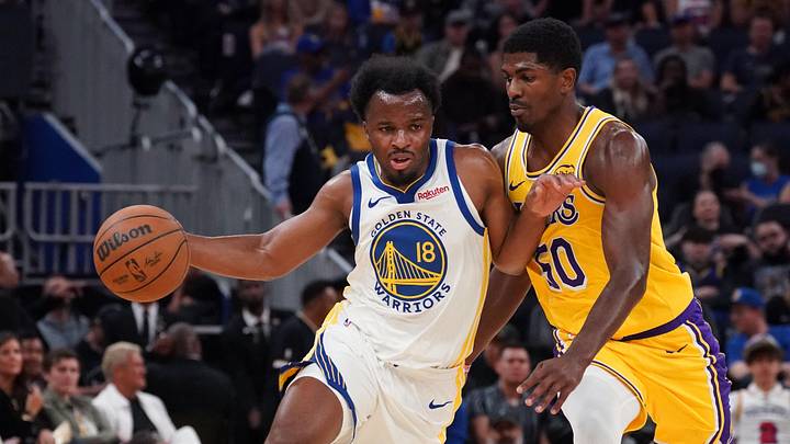 Oct 5, 2025; San Francisco, California, USA; Golden State Warriors guard LJ Cryer (18) is defended by Los Angeles Lakers guard Nate Williams (50) in the fourth quarter at Chase Center. Mandatory Credit: David Gonzales-Imagn Images Oct 5, 2025; San Francisco, California, USA; Golden State Warriors guard LJ Cryer (18) is defended by Los Angeles Lakers guard Nate Williams (50) in the fourth quarter at Chase Center. Mandatory Credit: David Gonzales-Imagn Images