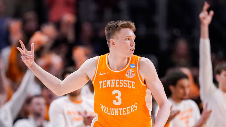 Tennessee Volunteers guard Dalton Knecht (3) holds up three fingers to celebrate a three-point basket Sunday, March 31, 2024, during the midwest regional championship at the Little Caesars Arena in Detroit. The Purdue Boilermakers defeated the Tennessee Volunteers, 72-66.