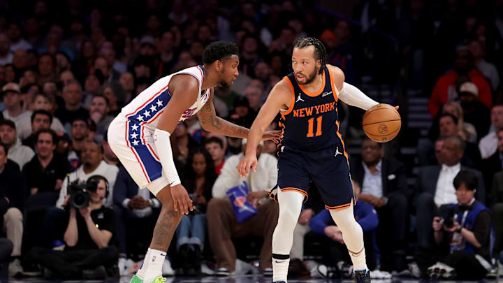 Feb 26, 2025; New York, New York, USA; New York Knicks guard Jalen Brunson (11) controls the ball against Philadelphia 76ers forward Justin Edwards (19) during the fourth quarter at Madison Square Garden. Mandatory Credit: Brad Penner-Imagn Images