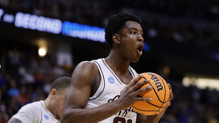 Mar 22, 2025; Denver, CO, USA; Texas A&M Aggies forward Pharrel Payne (21) reacts against the Michigan Wolverines during the first half in the second round of the NCAA Tournament  at Ball Arena. Mandatory Credit: Isaiah J. Downing-Imagn Images
