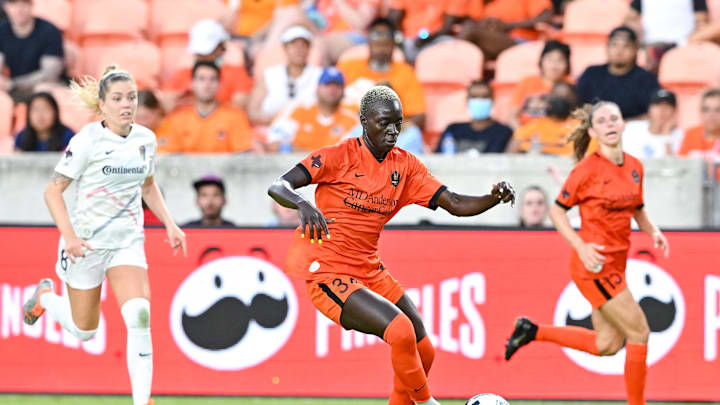 May 29, 2022; Houston, Texas, USA;  Houston Dash forward Michaela Abam (34) controls the ball