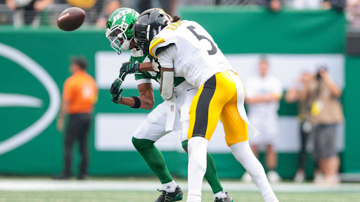 Pittsburgh Steelers cornerback Jalen Ramsey (5) breaks up a pass intended for New York Jets wide receiver Garrett Wilson (5) during the fourth quarter at MetLife Stadium. Pittsburgh Steelers cornerback Jalen Ramsey (5) breaks up a pass intended for New York Jets wide receiver Garrett Wilson (5) during the fourth quarter at MetLife Stadium.