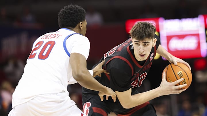 Feb 1, 2025; Dallas, Texas, USA; Stanford Cardinal forward Maxime Raynaud (42) looks to score as Southern Methodist Mustangs forward Jerrell Colbert (20) defends during the second half at Moody Coliseum. Mandatory Credit: Kevin Jairaj-Imagn Images Feb 1, 2025; Dallas, Texas, USA; Stanford Cardinal forward Maxime Raynaud (42) looks to score as Southern Methodist Mustangs forward Jerrell Colbert (20) defends during the second half at Moody Coliseum. Mandatory Credit: Kevin Jairaj-Imagn Images