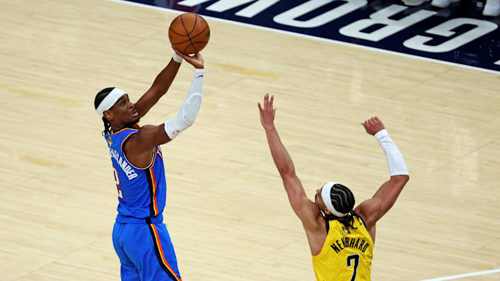 Jun 11, 2025; Indianapolis, Indiana, USA; Oklahoma City Thunder guard Shai Gilgeous-Alexander (2) shoots the ball against Indiana Pacers guard Andrew Nembhard (2) during the fourth quarter in game three of the 2025 NBA Finals at Gainbridge Fieldhouse. Mandatory Credit: Trevor Ruszkowski-Imagn Images Jun 11, 2025; Indianapolis, Indiana, USA; Oklahoma City Thunder guard Shai Gilgeous-Alexander (2) shoots the ball against Indiana Pacers guard Andrew Nembhard (2) during the fourth quarter in game three of the 2025 NBA Finals at Gainbridge Fieldhouse. Mandatory Credit: Trevor Ruszkowski-Imagn Images