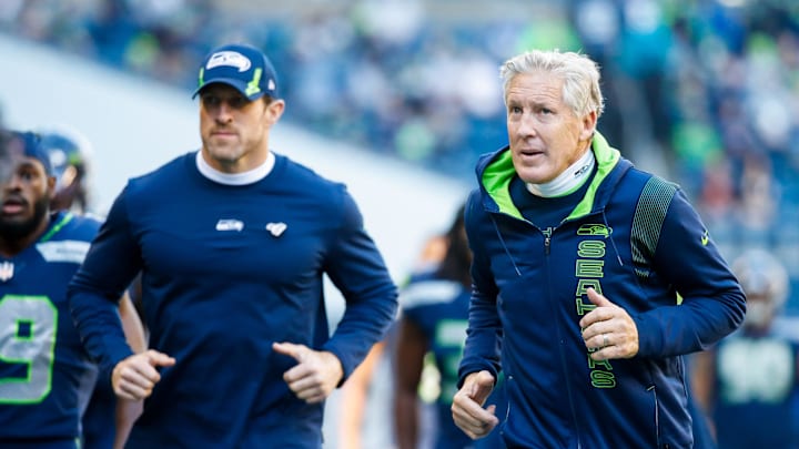 Oct 31, 2021; Seattle, Washington, USA; Seattle Seahawks head coach Pete Carroll returns to the locker room following the first half against the Jacksonville Jaguars at Lumen Field. Mandatory Credit: Joe Nicholson-Imagn Images