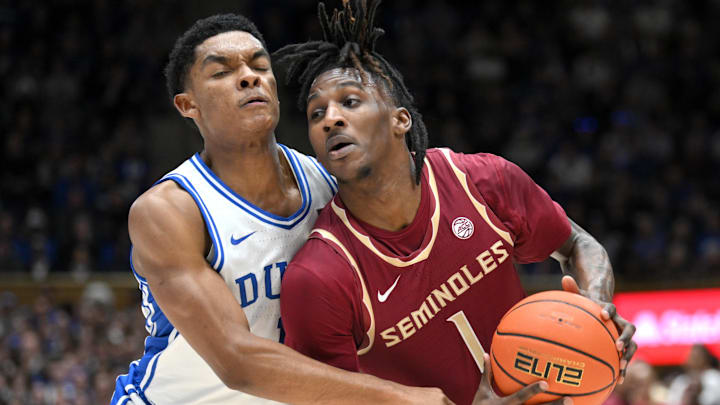 Mar 1, 2025; Durham, North Carolina, USA; Florida State Seminoles guard Jamir Watkins (1) breaks around Duke Blue Devils guard Caleb Foster (1) during the first half at Cameron Indoor Stadium. Mandatory Credit: Zachary Taft-Imagn Images Mar 1, 2025; Durham, North Carolina, USA; Florida State Seminoles guard Jamir Watkins (1) breaks around Duke Blue Devils guard Caleb Foster (1) during the first half at Cameron Indoor Stadium. Mandatory Credit: Zachary Taft-Imagn Images