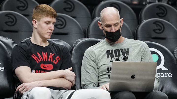 Jan 19, 2022; Atlanta, Georgia, USA; Atlanta Hawks guard Kevin Huerter (3) (left) talks with assistant coach Chris Jent center prior to the game against the Minnesota Timberwolves at State Farm Arena. Mandatory Credit: Dale Zanine-Imagn Images