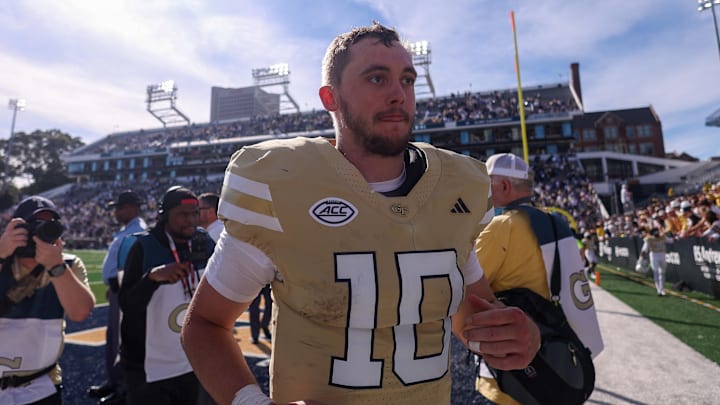 Oct 25, 2025; Atlanta, Georgia, USA; Georgia Tech Yellow Jackets quarterback Haynes King (10) celebrates after a victory over the Syracuse Orange at Bobby Dodd Stadium at Hyundai Field. Mandatory Credit: Brett Davis-Imagn Images
Oct 25, 2025; Atlanta, Georgia, USA; Georgia Tech Yellow Jackets quarterback Haynes King (10) celebrates after a victory over the Syracuse Orange at Bobby Dodd Stadium at Hyundai Field. Mandatory Credit: Brett Davis-Imagn Images