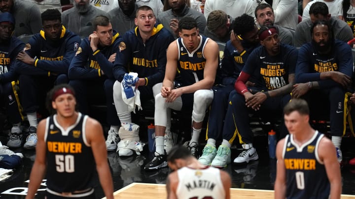 Jun 9, 2023; Miami, Florida, USA; Denver Nuggets players look on from the bench during the second half in game four of the 2023 NBA Finals against the Miami Heat at Kaseya Center. Mandatory Credit: Jim Rassol-USA TODAY Sports Jun 9, 2023; Miami, Florida, USA; Denver Nuggets players look on from the bench during the second half in game four of the 2023 NBA Finals against the Miami Heat at Kaseya Center. Mandatory Credit: Jim Rassol-USA TODAY Sports