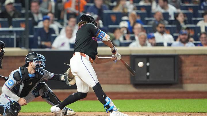 May 29, 2026; New York City, New York, USA;  New York Mets designated hitter MJ Melendez (1) hits a sacrifice fly ball against the Miami Marlins during the seventh inning at Citi Field. Mandatory Credit: Gregory Fisher-Imagn Images