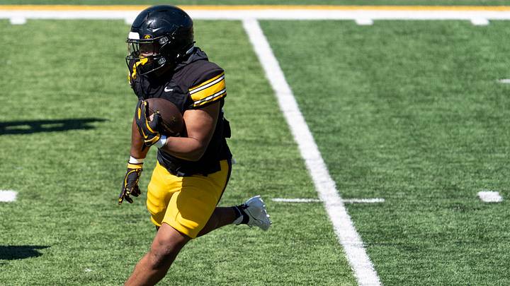 Iowa running back Lendon Phillips Jr. (21) carries the ball April 25, 2026 during the team’s spring practice at Kinnick Stadium in Iowa City, Iowa. Iowa running back Lendon Phillips Jr. (21) carries the ball April 25, 2026 during the team’s spring practice at Kinnick Stadium in Iowa City, Iowa.