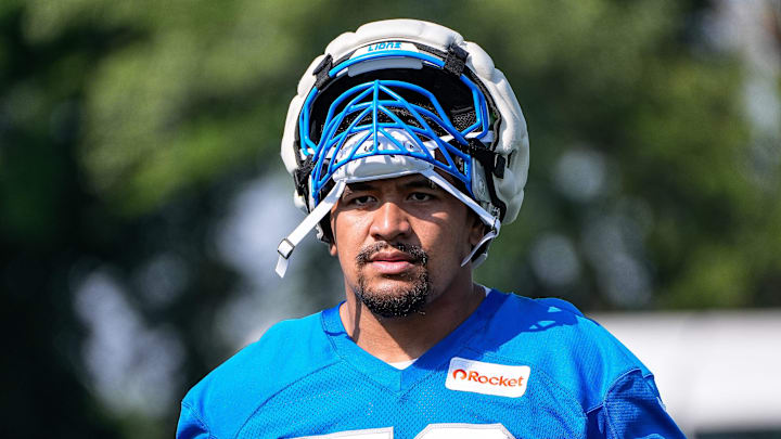 Detroit Lions offensive tackle Penei Sewell (58) walks off the field after practice during training camp at Meijer Performance Center in Allen Park on Monday, July 21, 2025.