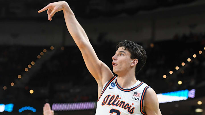 Illinois Fighting Illini guard Andrej Stojakovic (2) reacts after making a shot Thursday, March 19, 2026, during the NCAA Men’s Basketball Tournament first round game against the Penn Quakers at Bon Secours Wellness Arena in Greenville, South Carolina. Illinois Fighting Illini won 105-70.