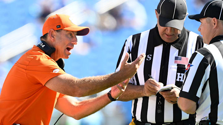 Oct 4, 2025; Chapel Hill, North Carolina, USA;  Clemson Tigers head coach Dabo Swinney argues with the referee in the fourth quarter at Kenan Stadium. Mandatory Credit: Bob Donnan-Imagn Images Oct 4, 2025; Chapel Hill, North Carolina, USA;  Clemson Tigers head coach Dabo Swinney argues with the referee in the fourth quarter at Kenan Stadium. Mandatory Credit: Bob Donnan-Imagn Images
