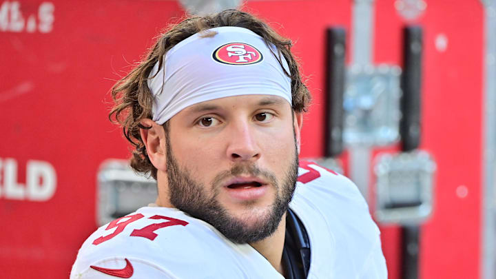 Jan 5, 2025; Glendale, Arizona, USA; San Francisco 49ers defensive end Nick Bosa (97) looks on in the first half against the Arizona Cardinals at State Farm Stadium. Mandatory Credit: Matt Kartozian-Imagn Images
