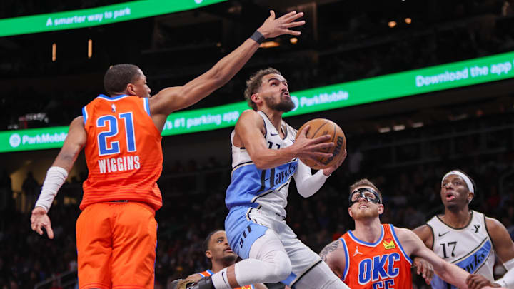 Feb 28, 2025; Atlanta, Georgia, USA; Atlanta Hawks guard Trae Young (11) shoots against the Oklahoma City Thunder in the third quarter at State Farm Arena. Mandatory Credit: Brett Davis-Imagn Images Feb 28, 2025; Atlanta, Georgia, USA; Atlanta Hawks guard Trae Young (11) shoots against the Oklahoma City Thunder in the third quarter at State Farm Arena. Mandatory Credit: Brett Davis-Imagn Images