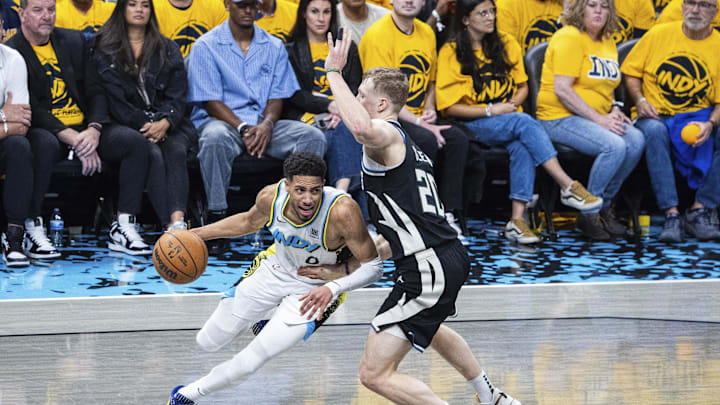 Apr 19, 2025; Indianapolis, Indiana, USA; Indiana Pacers guard Tyrese Haliburton (0) dribbles the ball while Milwaukee Bucks guard AJ Green (20) defends in the second half at Gainbridge Fieldhouse. Mandatory Credit: Trevor Ruszkowski-Imagn Images Apr 19, 2025; Indianapolis, Indiana, USA; Indiana Pacers guard Tyrese Haliburton (0) dribbles the ball while Milwaukee Bucks guard AJ Green (20) defends in the second half at Gainbridge Fieldhouse. Mandatory Credit: Trevor Ruszkowski-Imagn Images