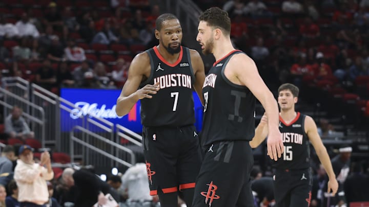 Feb 25, 2026; Houston, Texas, USA; Houston Rockets forward Kevin Durant (7) celebrates with center Alperen Sengun (28) after a play during the first quarter against the Sacramento Kings at Toyota Center. Mandatory Credit: Troy Taormina-Imagn Images