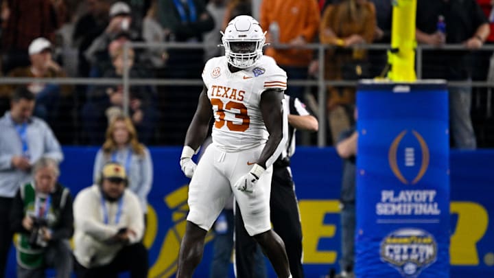 Jan 10, 2025; Arlington, TX, USA; Texas Longhorns linebacker David Gbenda (33) in action during the game between the Texas Longhorns and the Ohio State Buckeyes at AT&T Stadium. Mandatory Credit: Jerome Miron-Imagn Images
