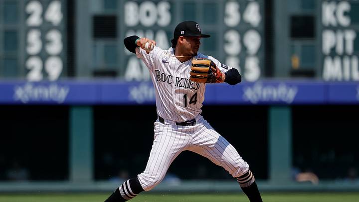 Ezequiel Tovar attempts to turn a double play in the sixth inning against the Tampa Bay Rays at Coors Field. Ezequiel Tovar attempts to turn a double play in the sixth inning against the Tampa Bay Rays at Coors Field.