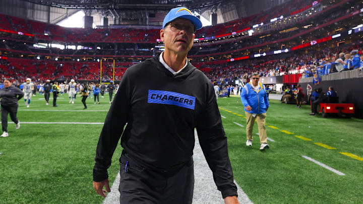Dec 1, 2024; Atlanta, Georgia, USA; Los Angeles Chargers head coach Jim Harbaugh walks off the field after a victory over the Atlanta Falcons at Mercedes-Benz Stadium. Mandatory Credit: Brett Davis-Imagn Images