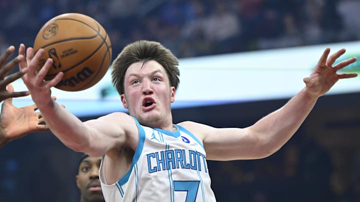 Dec 14, 2025; Cleveland, Ohio, USA; Charlotte Hornets guard Kon Knueppel (7) rebounds in the first quarter against the Cleveland Cavaliers at Rocket Arena. Mandatory Credit: David Richard-Imagn Images Dec 14, 2025; Cleveland, Ohio, USA; Charlotte Hornets guard Kon Knueppel (7) rebounds in the first quarter against the Cleveland Cavaliers at Rocket Arena. Mandatory Credit: David Richard-Imagn Images