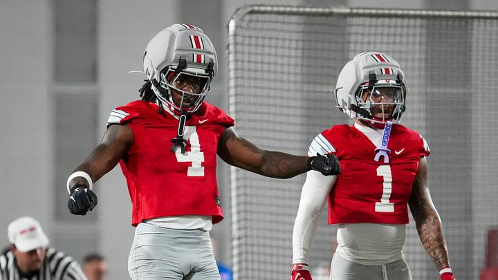 Ohio State Buckeyes wide receivers Jeremiah Smith (4) and Brandon Inniss (1) await a punt during football training camp inside the Woody Hayes Athletic Center in Columbus on Aug. 7, 2026. Ohio State Buckeyes wide receivers Jeremiah Smith (4) and Brandon Inniss (1) await a punt during football training camp inside the Woody Hayes Athletic Center in Columbus on Aug. 7, 2026.