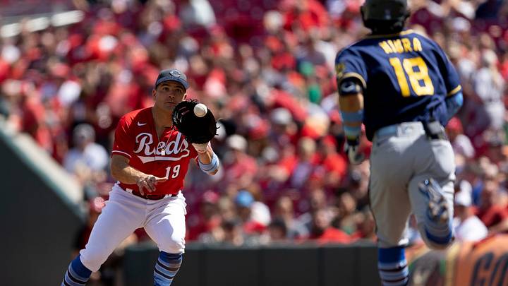 Cincinnati Reds first baseman Joey Votto (19) catches a throw from home after a pitch in the dirt on a called strike three against Milwaukee Brewers first baseman Keston Hiura (18) in the seventh inning of the MLB game between the Cincinnati Reds and the Milwaukee Brewers in Cincinnati at Great American Ball Park on Sunday, June 19, 2022.

Milwaukee Brewers At Cincinnati Reds 44