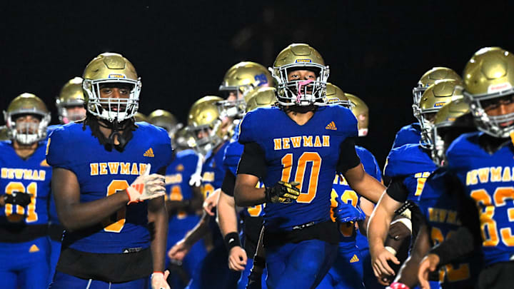 Cardinal Newman football beat Carrollwood Day in the Class 1A state semifinals on Dec. 5 to clinch a berth in the state championship Thursday, Dec. 11, against national powerhouse Chaminade-Madonna at FIU's Pitbull Stadium in Miami. Cardinal Newman football beat Carrollwood Day in the Class 1A state semifinals on Dec. 5 to clinch a berth in the state championship Thursday, Dec. 11, against national powerhouse Chaminade-Madonna at FIU's Pitbull Stadium in Miami.