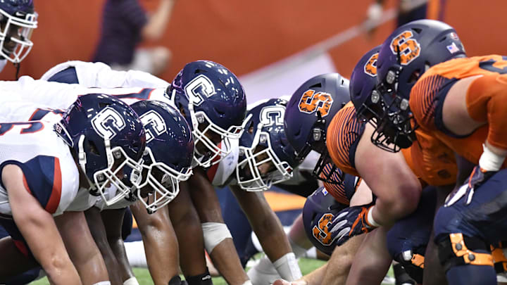 Sep 22, 2018; Syracuse, NY, USA; The Connecticut Huskies and Syracuse Orange line up against each other for an extra point during the fourth quarter at the Carrier Dome. Mandatory Credit: Mark Konezny-Imagn Images