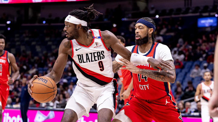 Nov 4, 2024; New Orleans, Louisiana, USA; Portland Trail Blazers forward Jerami Grant (9) dribbles against New Orleans Pelicans forward Brandon Ingram (14) during the first half at Smoothie King Center. Mandatory Credit: Stephen Lew-Imagn Images Nov 4, 2024; New Orleans, Louisiana, USA; Portland Trail Blazers forward Jerami Grant (9) dribbles against New Orleans Pelicans forward Brandon Ingram (14) during the first half at Smoothie King Center. Mandatory Credit: Stephen Lew-Imagn Images