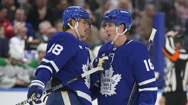 Jan 14, 2025; Toronto, Ontario, CAN; Toronto Maple Leafs forward William Nylander (88) and forward Mitch Marner (16) talk during a break in the action against the Dallas Stars during the third period at Scotiabank Arena. Mandatory Credit: John E. Sokolowski-Imagn Images