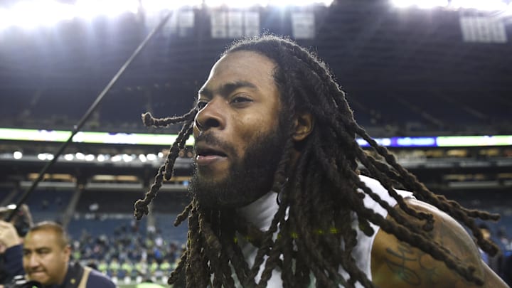 San Francisco 49ers cornerback Richard Sherman runs off the field after a football game against the Seattle Seahawks.