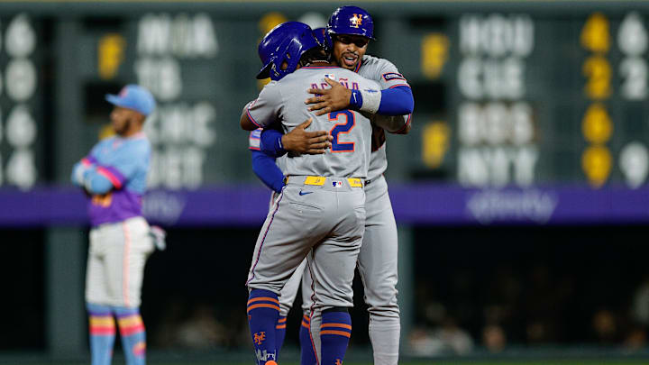 Jun 6, 2025; Denver, Colorado, USA; New York Mets pinch runner Luisangel Acuna (2) is greeted by pinch hitter Francisco Lindor (12) as he comes out to pinch run in the ninth inning against the Colorado Rockies at Coors Field. Mandatory Credit: Isaiah J. Downing-Imagn Images Jun 6, 2025; Denver, Colorado, USA; New York Mets pinch runner Luisangel Acuna (2) is greeted by pinch hitter Francisco Lindor (12) as he comes out to pinch run in the ninth inning against the Colorado Rockies at Coors Field. Mandatory Credit: Isaiah J. Downing-Imagn Images