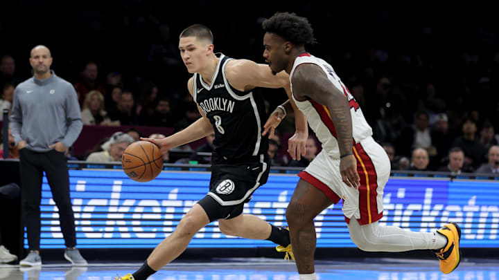 Dec 18, 2025; Brooklyn, New York, USA; Brooklyn Nets guard Egor Demin (8) drives to the basket against Miami Heat guard Davion Mitchell (45) during the first quarter at Barclays Center. Mandatory Credit: Brad Penner-Imagn Images Dec 18, 2025; Brooklyn, New York, USA; Brooklyn Nets guard Egor Demin (8) drives to the basket against Miami Heat guard Davion Mitchell (45) during the first quarter at Barclays Center. Mandatory Credit: Brad Penner-Imagn Images