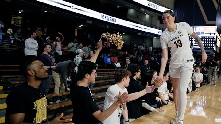 Vanderbilt guard Justine Pissott (13) is congratulated by fans after the team’s win against Missouri in an NCAA college basketball game at Memorial Gymnasium Thursday, Jan. 8, 2026, in Nashville, Tenn.