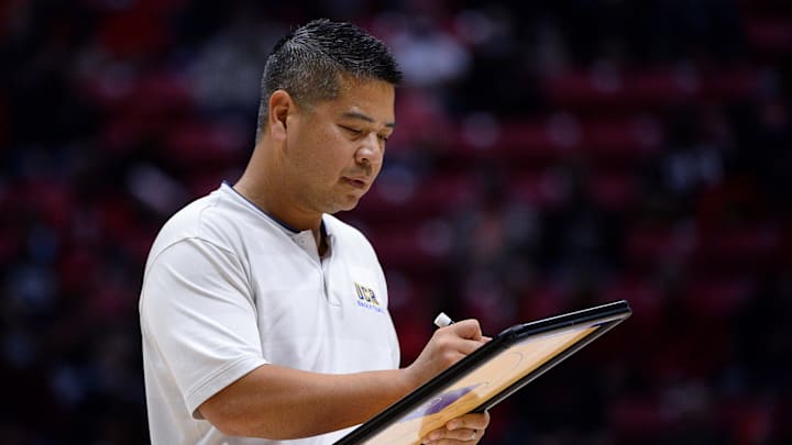Nov 9, 2021; San Diego, California, USA; UC Riverside Highlanders head coach Mike Magpayo writes on a white board during a pause in play in the first half against the San Diego State Aztecs at Viejas Arena. Mandatory Credit: Orlando Ramirez-Imagn Images