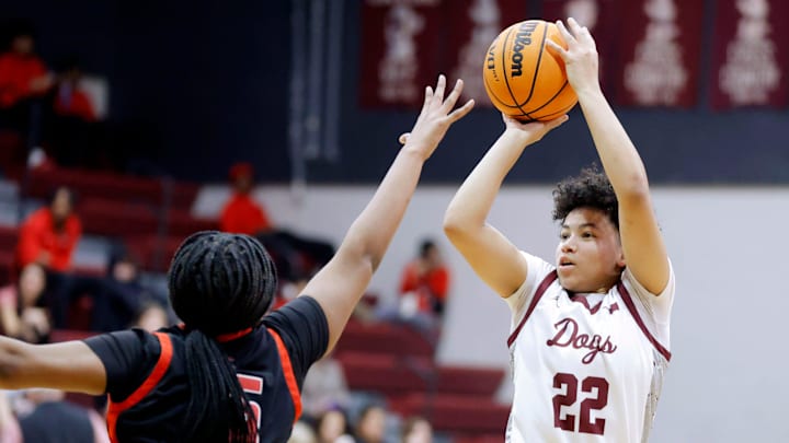 Edmond Memorial's Janiyah Williams, right, hit a game-winning shot that's up for national high school girls basketball play of the week.