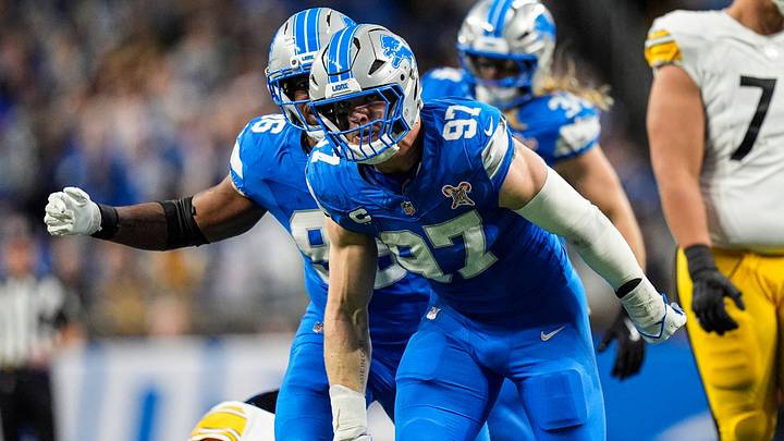Detroit Lions defensive end Aidan Hutchinson (97) celebrates a sack against Pittsburgh Steelers during the first half at Ford Field in Detroit on Sunday, Dec. 21, 2025. Detroit Lions defensive end Aidan Hutchinson (97) celebrates a sack against Pittsburgh Steelers during the first half at Ford Field in Detroit on Sunday, Dec. 21, 2025.