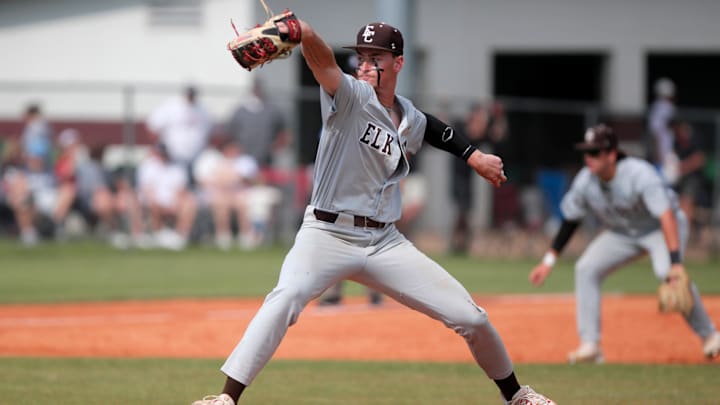 Kash Mayfield pitches during a class 4A baseball state tournament game between Tuttle and Elk City in Edmond, Okla.