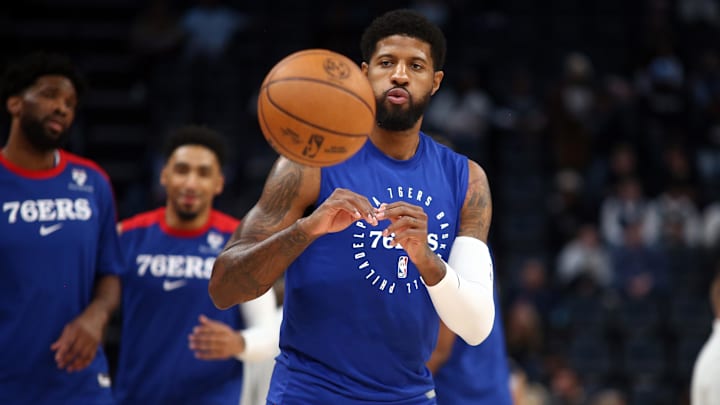 Nov 20, 2024; Memphis, Tennessee, USA; Philadelphia 76ers forward Paul George (8) catches a pass during warm ups prior to the game against the Memphis Grizzlies at FedExForum. Mandatory Credit: Petre Thomas-Imagn Images