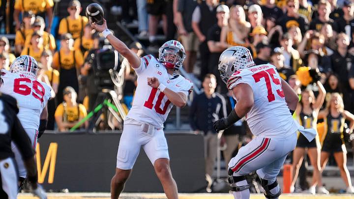 Ohio State Buckeyes quarterback Julian Sayin (10) launches a touchdown pass to wide receiver Jeremiah Smith (4) during the NCAA football game at Kinnick Stadium in Iowa City on Oct. 3, 2026. Ohio State on 31-14. Ohio State Buckeyes quarterback Julian Sayin (10) launches a touchdown pass to wide receiver Jeremiah Smith (4) during the NCAA football game at Kinnick Stadium in Iowa City on Oct. 3, 2026. Ohio State on 31-14.