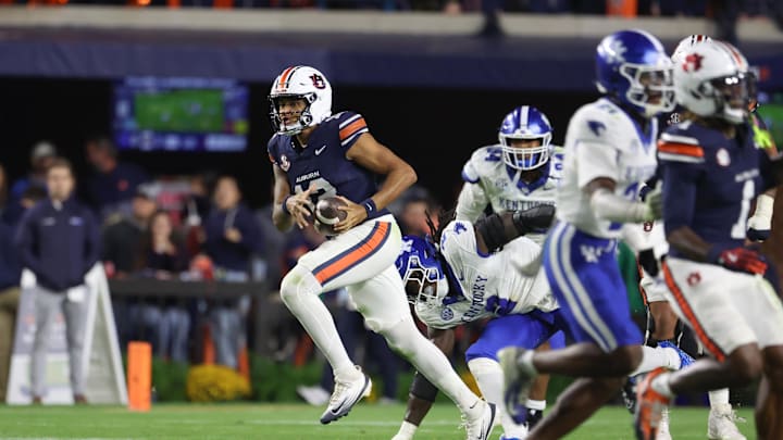 Nov 1, 2025; Auburn, Alabama, USA; Auburn Tigers quarterback Ashton Daniels (12) scrambles for yardage against the Kentucky Wildcats during the third quarter at Jordan-Hare Stadium. Mandatory Credit: John Reed-Imagn Images Nov 1, 2025; Auburn, Alabama, USA; Auburn Tigers quarterback Ashton Daniels (12) scrambles for yardage against the Kentucky Wildcats during the third quarter at Jordan-Hare Stadium. Mandatory Credit: John Reed-Imagn Images