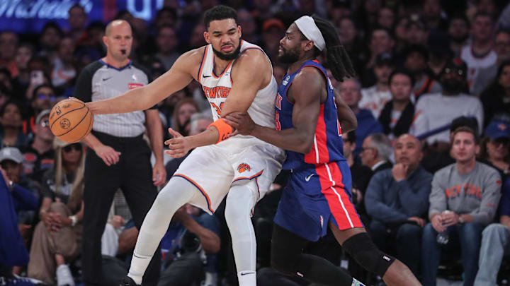New York Knicks center Karl-Anthony Towns looks to post up on Detroit Pistons center Isaiah Stewart. Mandatory Credit: Wendell Cruz-Imagn Images