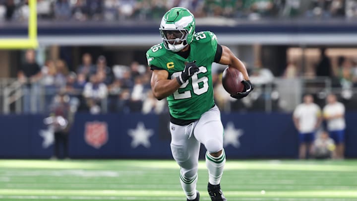 Nov 23, 2025; Arlington, Texas, USA; Philadelphia Eagles running back Saquon Barkley (26) runs with the ball in the first quarter against the Dallas Cowboys at AT&T Stadium. Mandatory Credit: Kevin Jairaj-Imagn Images