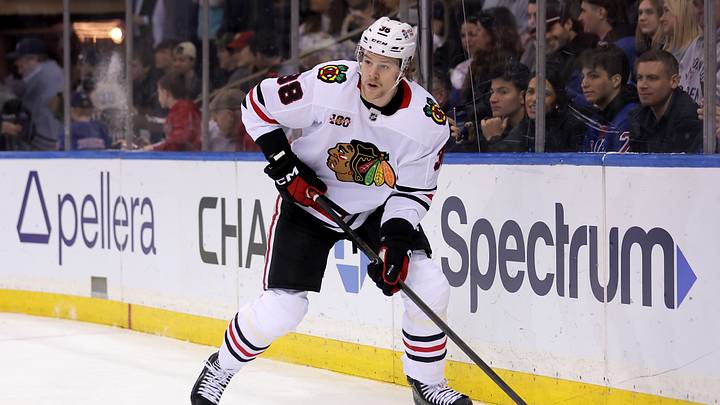 Mar 27, 2026; New York, New York, USA; Chicago Blackhawks defenseman Ethan del Mastro (38) controls the puck against the New York Rangers during the second period at Madison Square Garden. Mandatory Credit: Brad Penner-Imagn Images