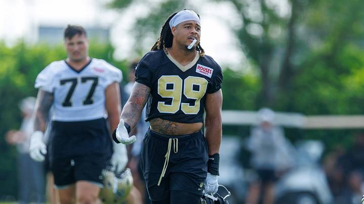 New Orleans Saints defensive end Chase Young (99) looks on during training camp at Ochsner Sports Performance Center. Mandatory Credit: Stephen Lew-Imagn Images New Orleans Saints defensive end Chase Young (99) looks on during training camp at Ochsner Sports Performance Center. Mandatory Credit: Stephen Lew-Imagn Images