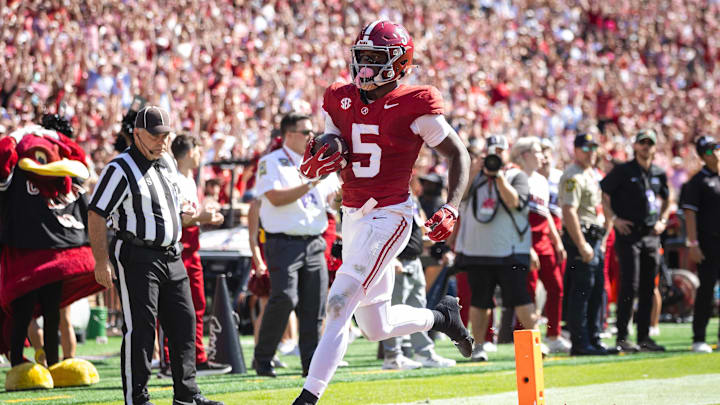 Oct 12, 2024; Tuscaloosa, Alabama, USA; Alabama Crimson Tide wide receiver Germie Bernard (5) scores a touchdown against the South Carolina Gamecocks during the fourth quarter at Bryant-Denny Stadium. Mandatory Credit: Will McLelland-Imagn Images