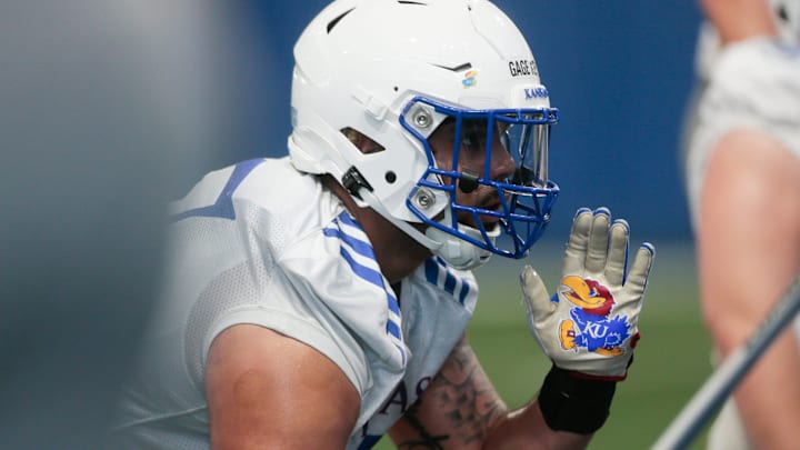 Kansas redshirt sophomore defensive lineman Gage Keys (17) lines up a play during Tuesday's practice