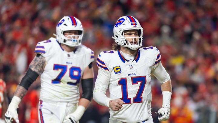 Jan 26, 2025; Kansas City, MO, USA; Buffalo Bills quarterback Josh Allen (17) and offensive tackle Spencer Brown (79) against the Kansas City Chiefs during the AFC Championship game at GEHA Field at Arrowhead Stadium. 